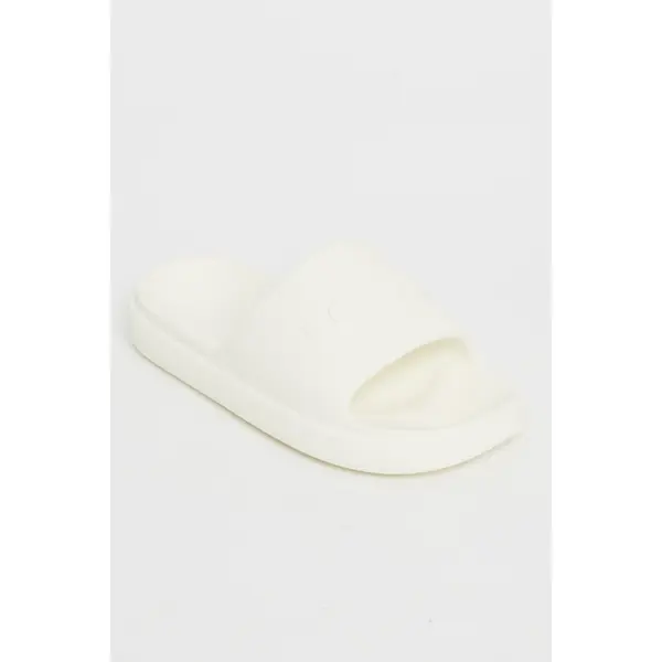 Claquettes June Next s blanches