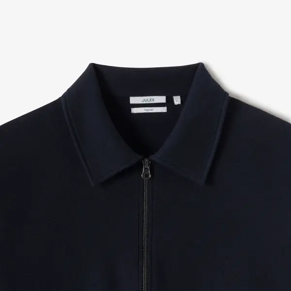 Sweat col polo zippé uni