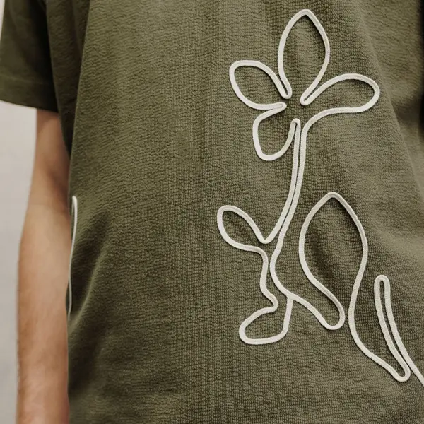 Tee shirt fleurs en cordelette matière fantaisie