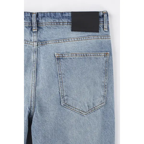 Jeans bleu denim délavé coupe confort