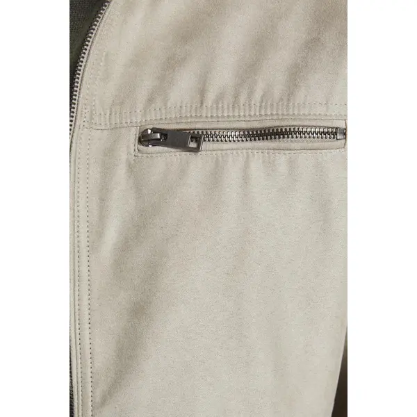 Blouson beige en simili cuir