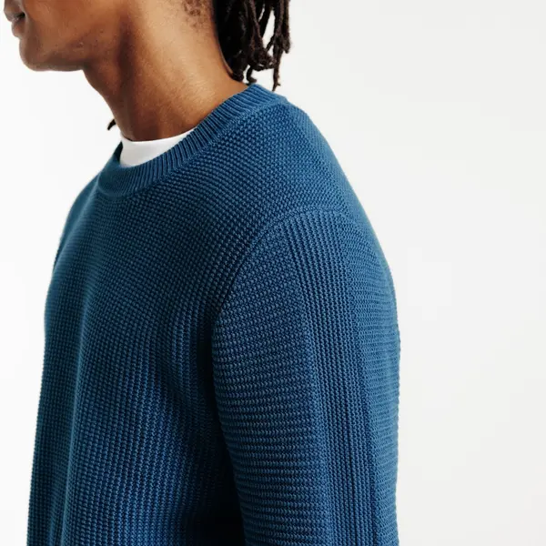 Pull col rond jeux de points fantaisie