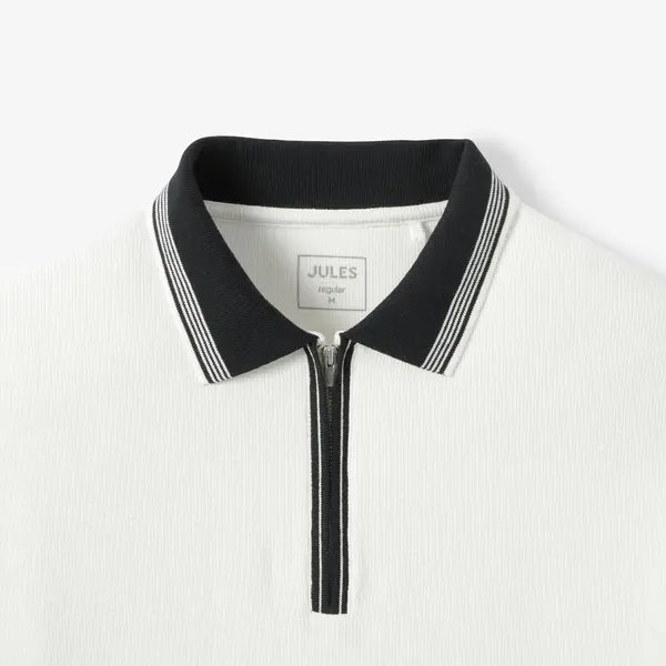 Polo manches courtes col zippé gaufré