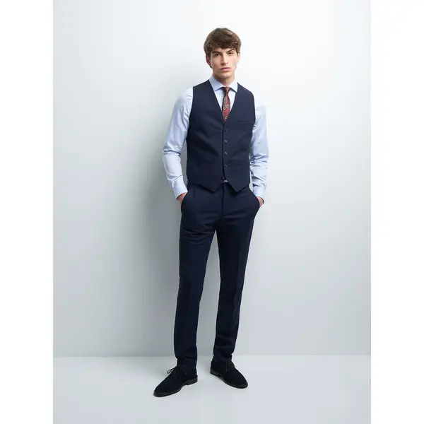 Gilet coordonnable en laine uni
