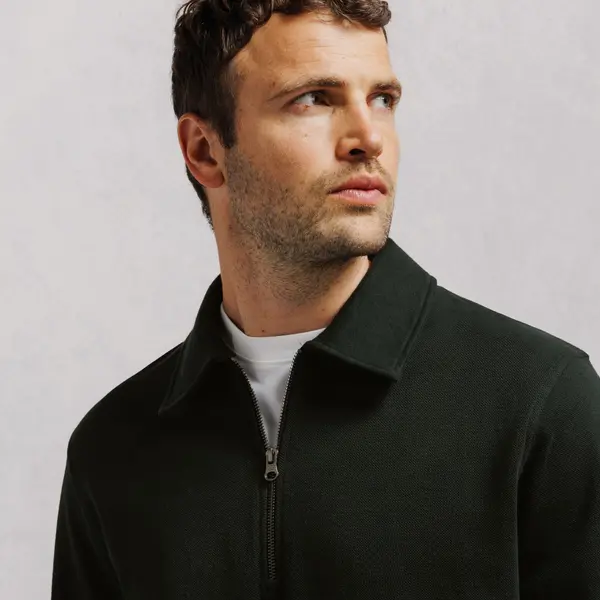 Sweat col polo zippé uni