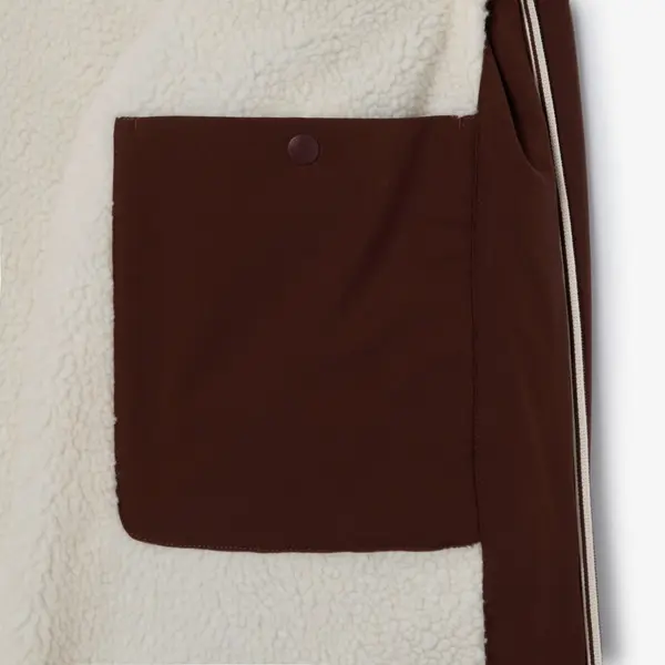 Parka longue à capuche doublée en sherpa