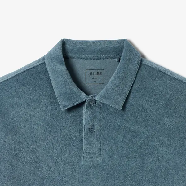 Polo manches courtes uni matière éponge