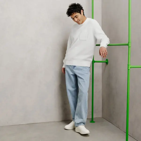 Pull col rond point de riz poche poitrine