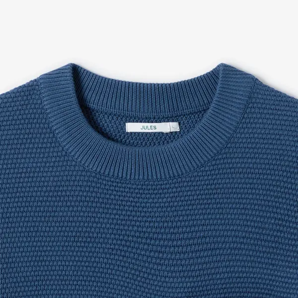 Pull col rond point de riz poche poitrine